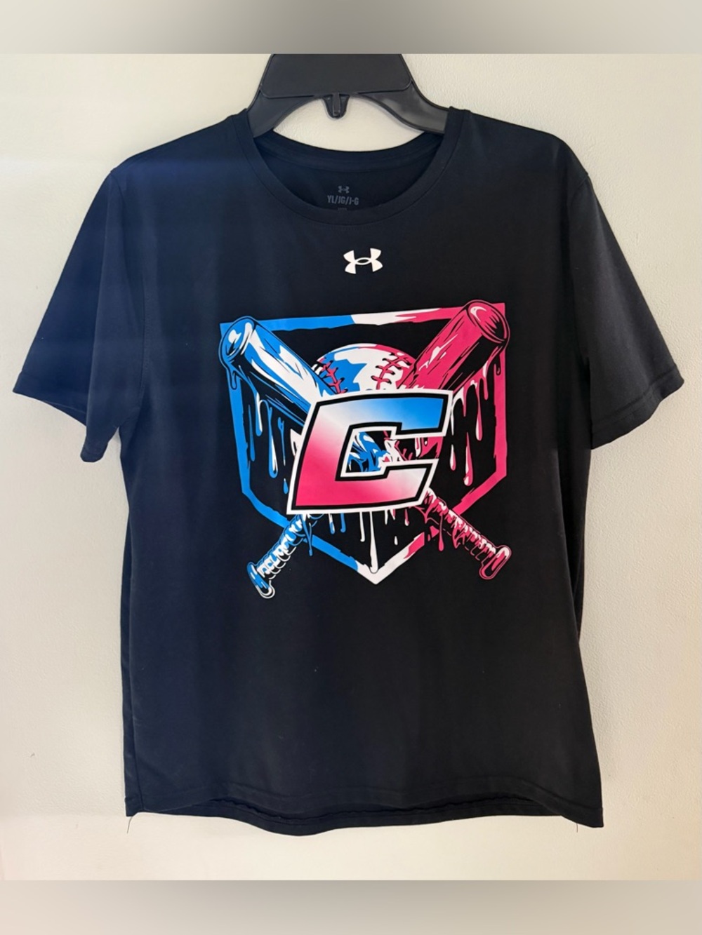 Under Armour Black Youth Loose Fit Tee with pink, blue and white Canes logo